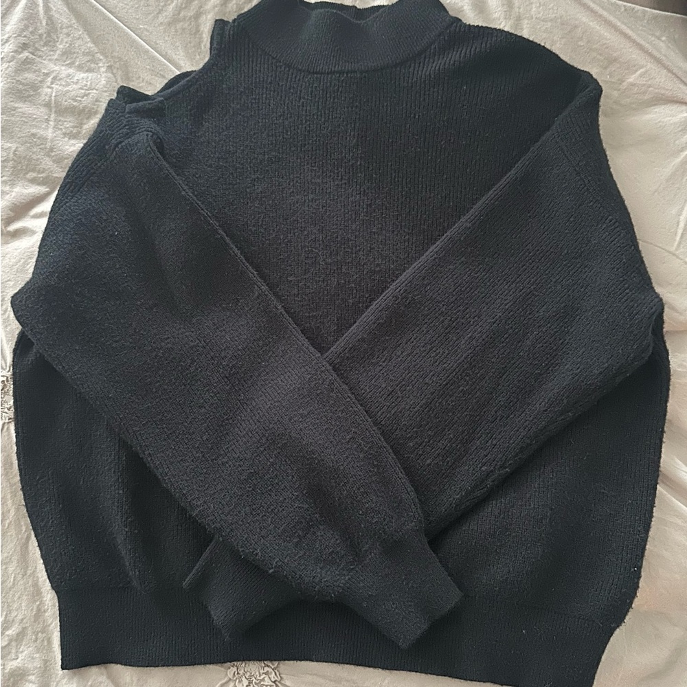 Open shoulder sweater